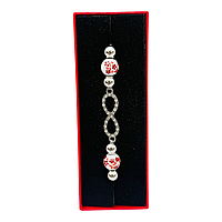Bratara Martisor cu Simbolul Infinitului si Margele Rosii , Cadou cu Semnificatie