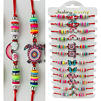 Set 12 Bratari Martisor, bile si simbol din Inox, snur rosu reglabil, modele de copii, diferite in set