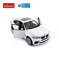 Masinuta metalica BMW X6M alb scara 1:24