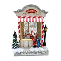 Decoratiune de Craciun reprezentand casa dulciurilor, cu copii, muzica si lumina, 16x23 cm